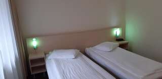 Отель Hotel Panoramic Рымнику-Вылча Двухместный номер с 1 кроватью или 2 отдельными кроватями-4