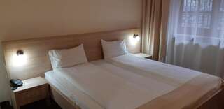 Отель Hotel Panoramic Рымнику-Вылча Двухместный номер с 1 кроватью или 2 отдельными кроватями-19